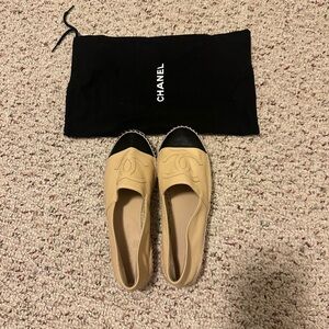 NWT Chanel Tan and Black Espadrilles Chic Slip-On